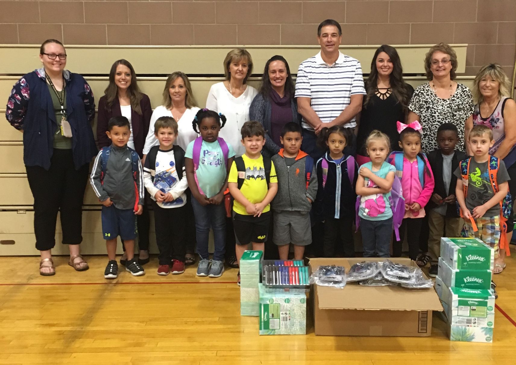 Thompson Insurance presents school supplies to Lena Dunn Elementary
